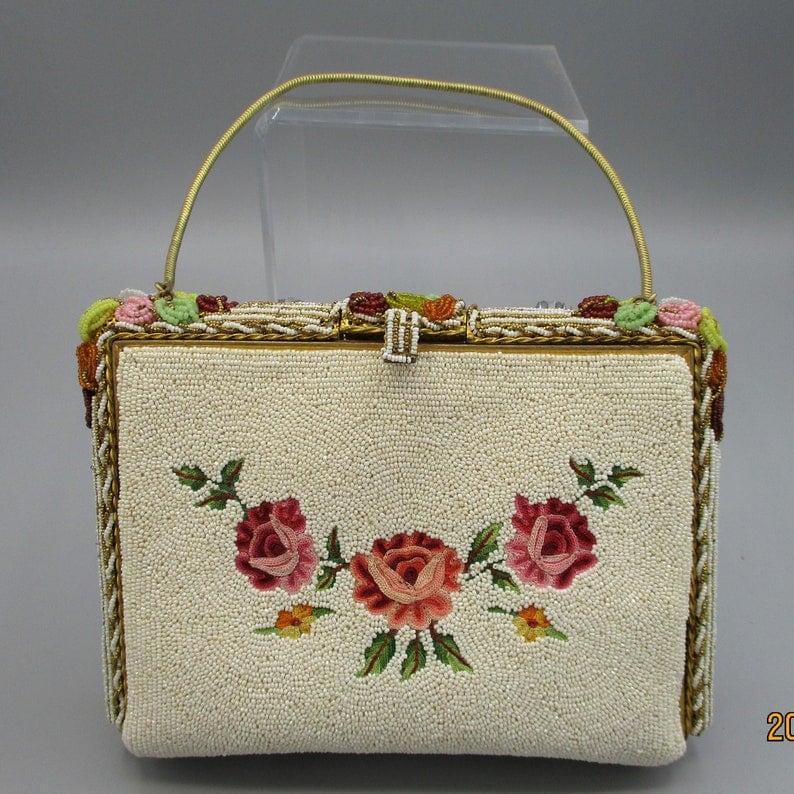 Vintage beaded bag with a beautiful old multicolored pattern